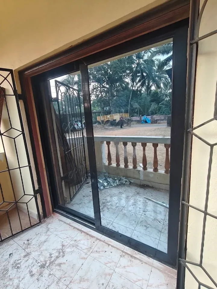 Dark framed balcony sliding door